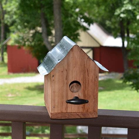 wooden bird houses metal roof|metal house shaped bird feeder.